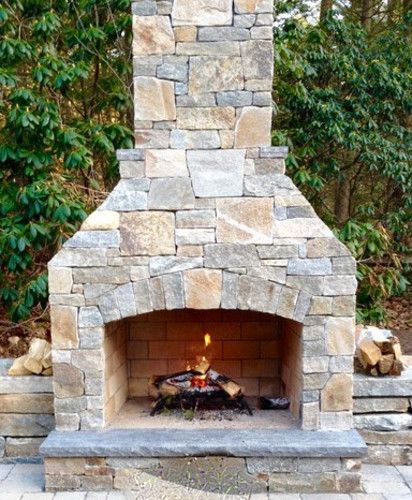 outdoor fireplace with stone feature