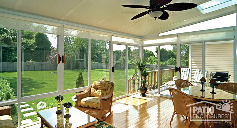 enclosed patio with light hardwood flooring