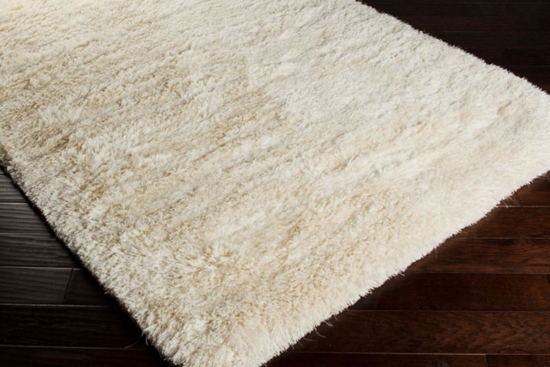 plush mat on top of hardwood flooring