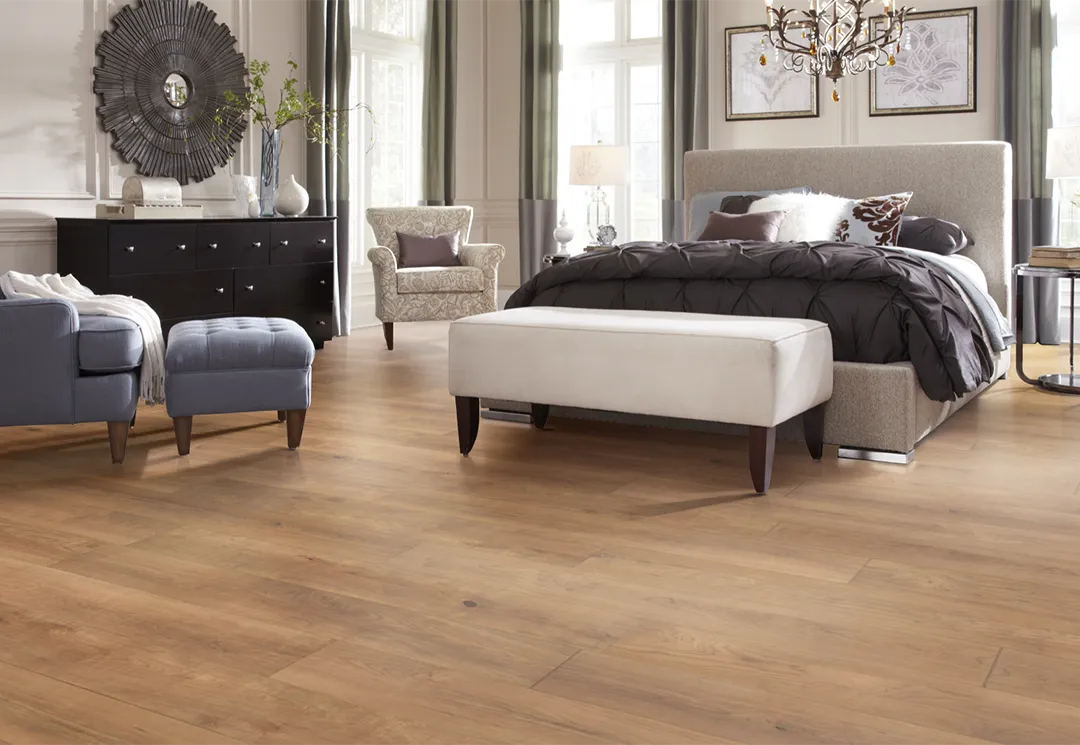 Medium colored laminate in cozy contemporary bedroom | Dolphin Carpet